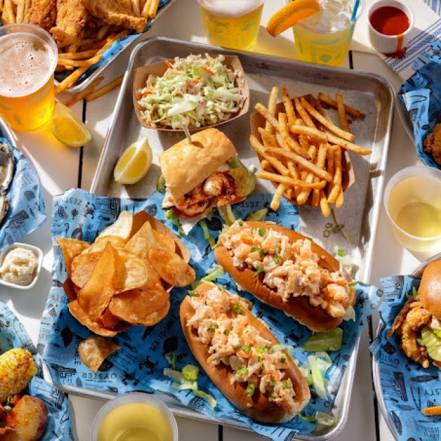 District Seafood, various dishes on a table