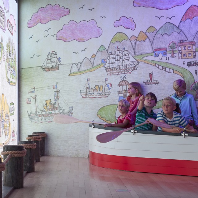 Children playing in an interactive art gallery boat.