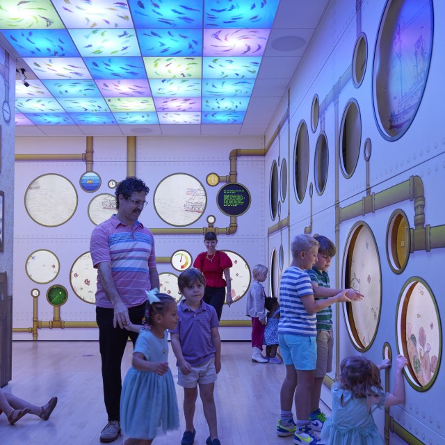 Children playing in an interactive art museum