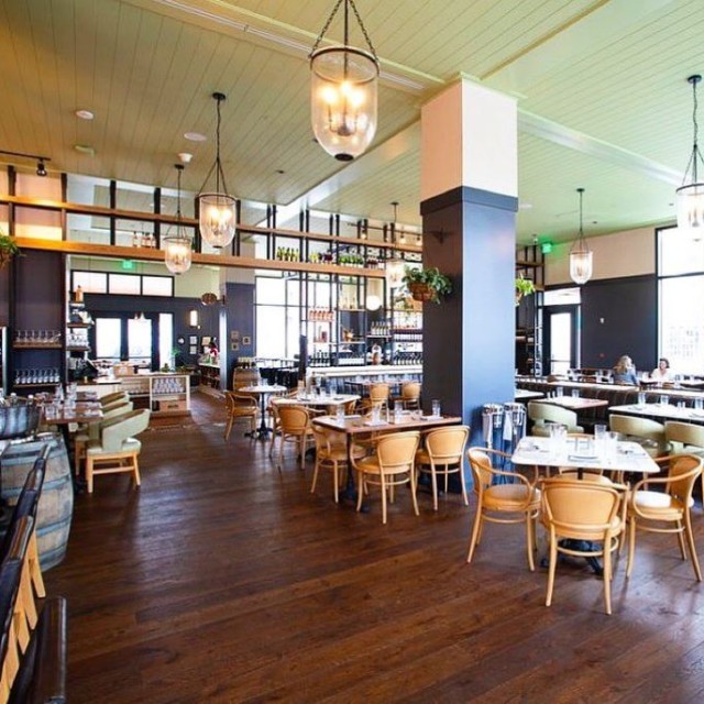 The Emporium Kitchen & Wine Market is located in the Perry Lane Hotel. The Emporium Kitchen & Wine Market is located in the Perry Lane Hotel.