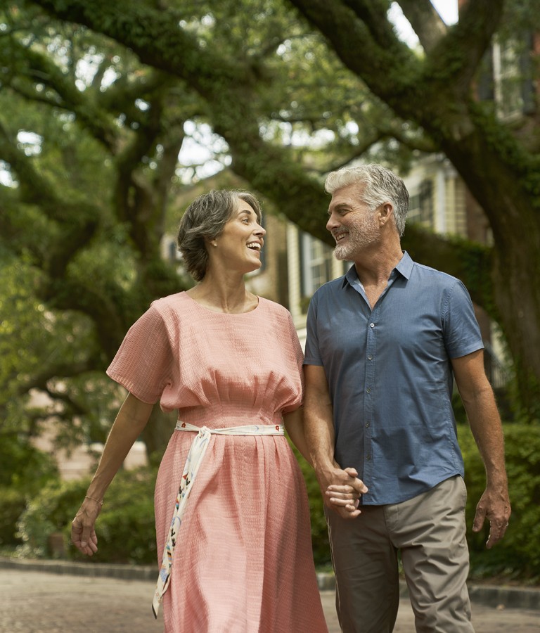 couple walking down jones street