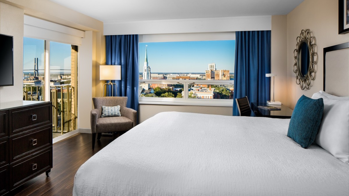 The Desoto Savannah. A room with a king bed at The Desoto Savannah.