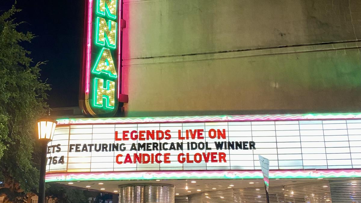 The Historic Savannah Theatre marquee lights up the Savannah skyline.