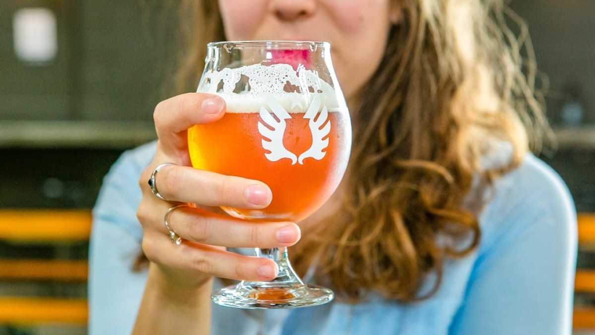 Service-Brewing-woman-drinking-beer.jpg