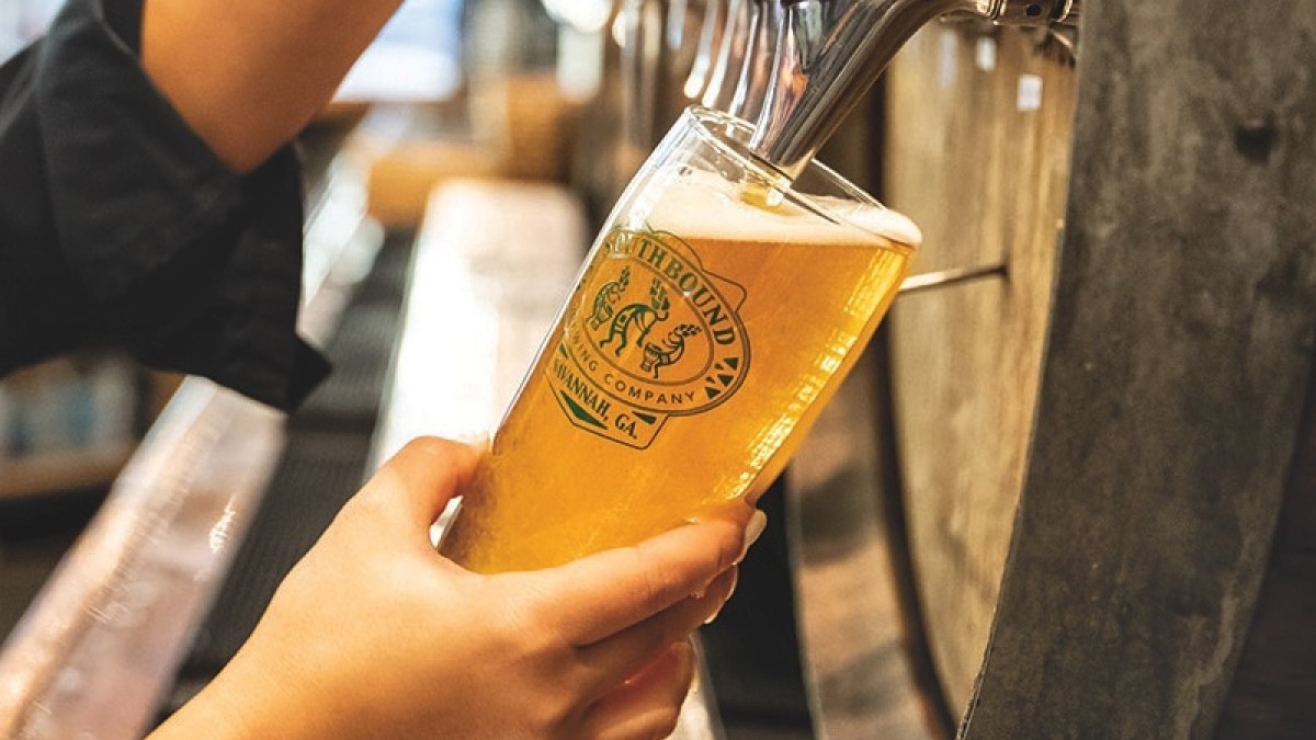 Bartender pouring a beer at Southbound Brewing Co. in Savannah, Ga.