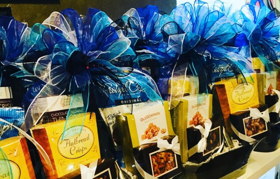 Customized Gift Baskets - Customized Corporate Gift Baskets that incorporate the clients branded colors and promotional items. Customized Gift Baskets - Customized Corporate Gift Baskets that incorporate the clients branded colors and promotional items.