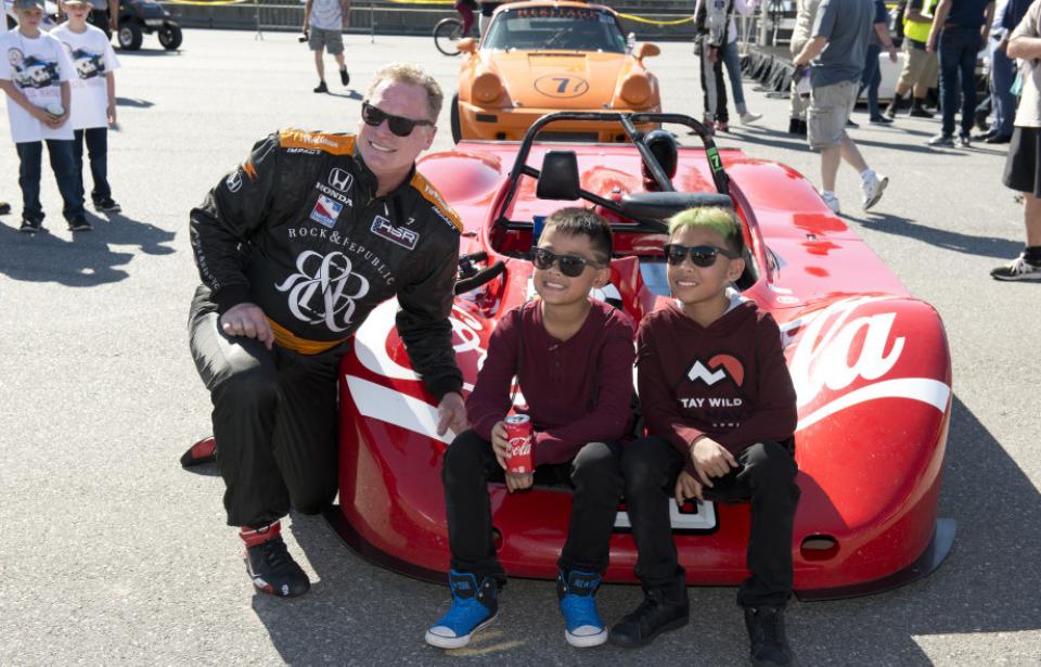 Fun for the whole Family - Kids and drivers pose in front of the Coca-Cola race car. Up close & personal! Fun for the whole Family - Kids and drivers pose in front of the Coca-Cola race car. Up close & personal!