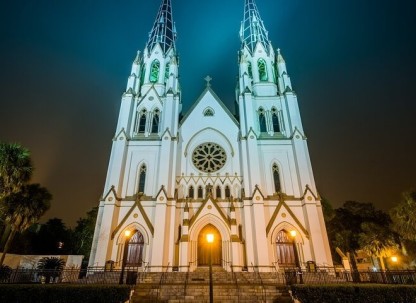 An eerie scene of a church at night.