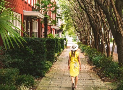 Solo traveler walking the street in Savannah, Georgia.