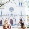 The Cathedral of St. John the Baptist is an iconic architectural masterpiece. Visitors snap photos of the Cathedral of St. John the Baptist
