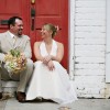 A couple sits in a doorway in Savannah, Georgia. A couple sits in a doorway in Savannah, Georgia.