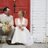 A couple sits in a doorway in Savannah, Georgia.